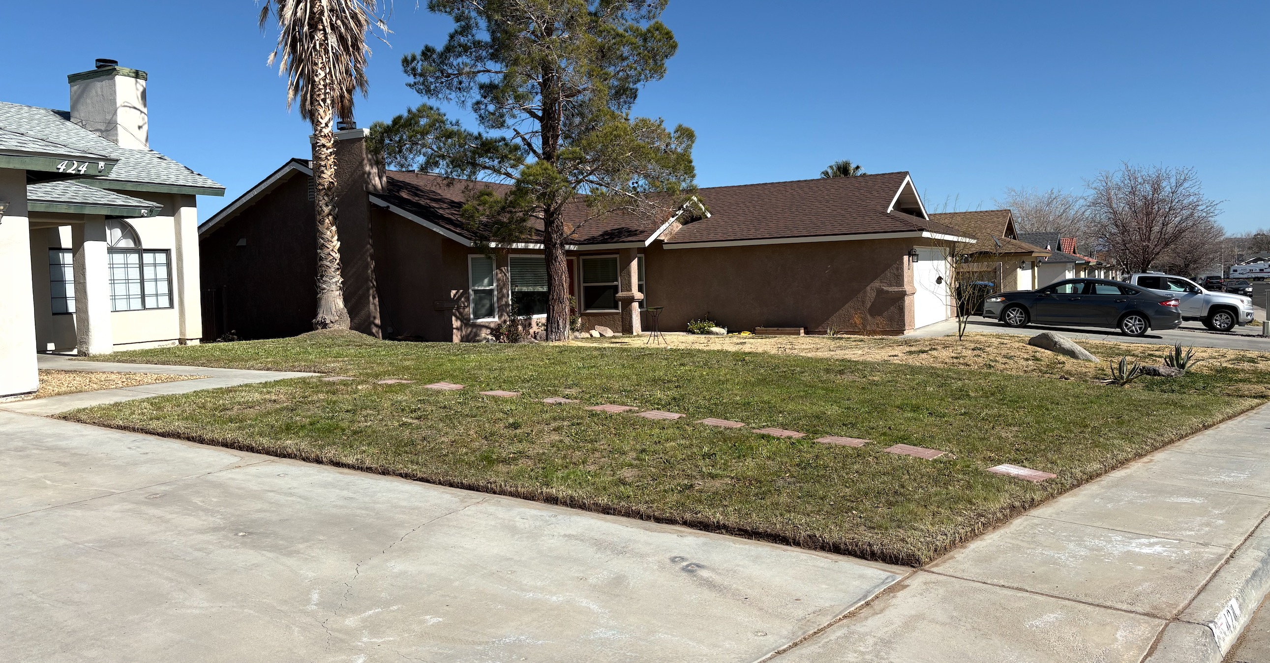 Front yard lawn care with clean edging in Ridgecrest CA by WeMow760